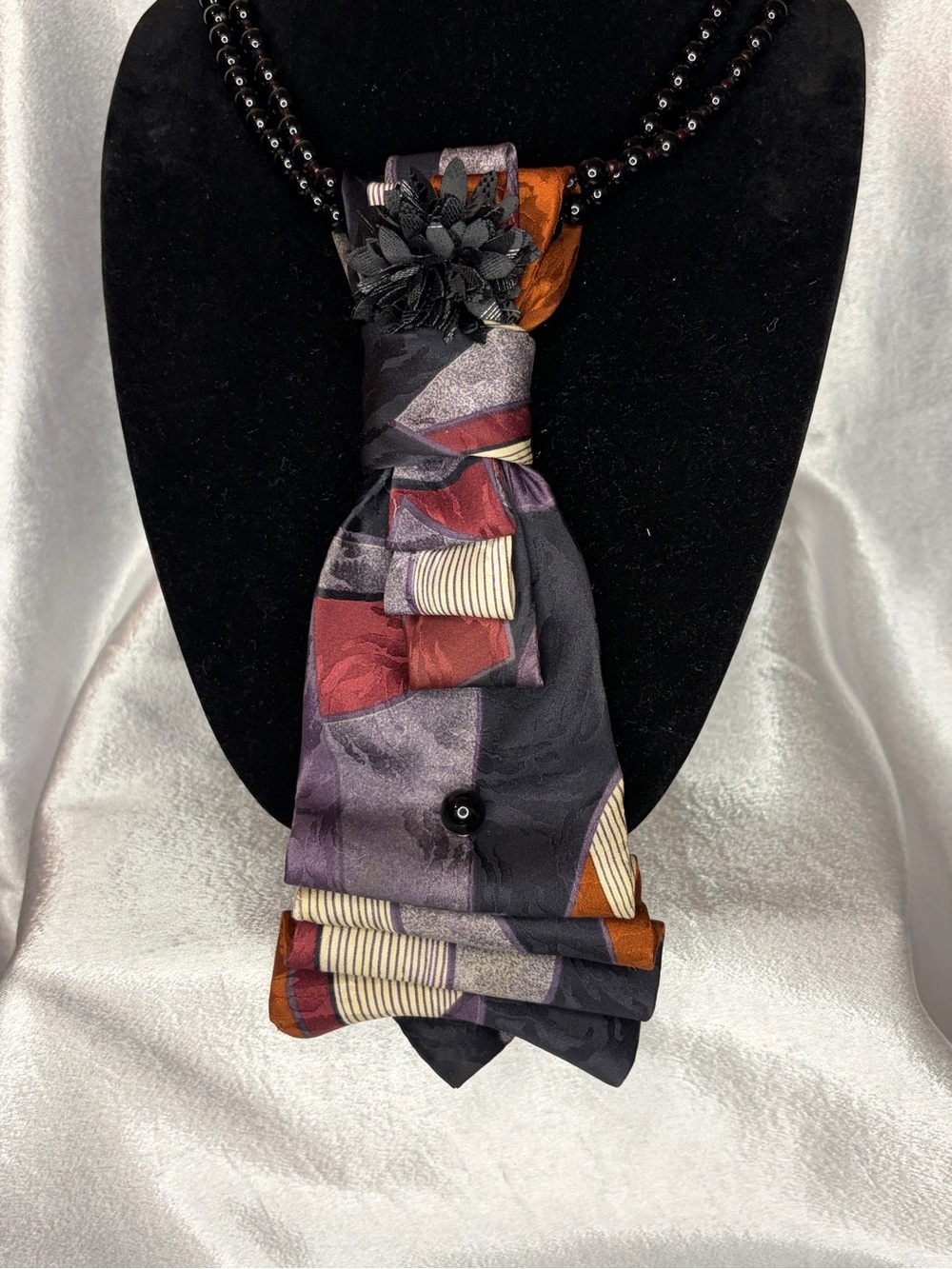 Multi-Color Floral Accent Necklace Tie in Black and Purple.